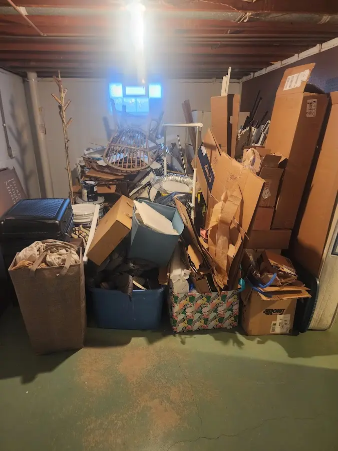 Roll-off dumpster container at job site for 4 Yard Dumpster Rental in Cullowhee